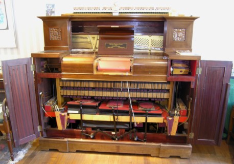 Welte-Mignon in a Steinway piano (keyboardless) from the Condon collection. These instruments were first marketed in 1905. M Welte & Sons advertisement for the "Mignon" is on the left.